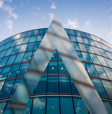 exterior shot of a building in London's financial district with the Maven A logo overlayed